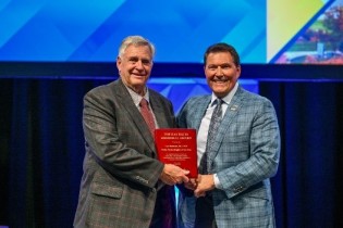 IWE founder Les Norman, proud recipient of the 2023 Association of Water Technologies (AWT) Ray Baum Award.